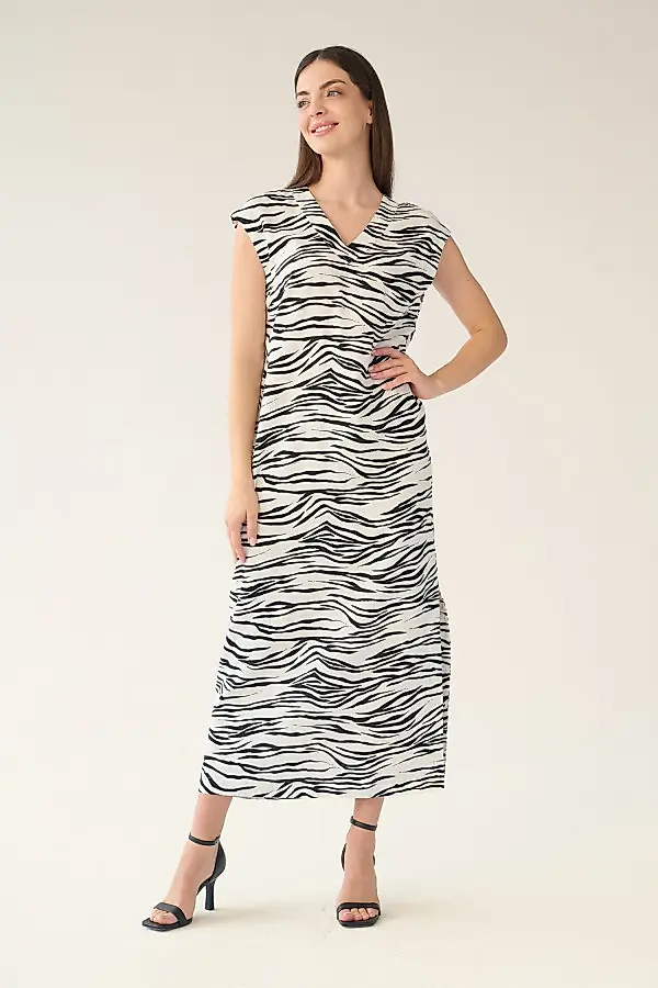 Czarno-złamano biała kobieca kremowa sukienka damska w motywy zwierzęce